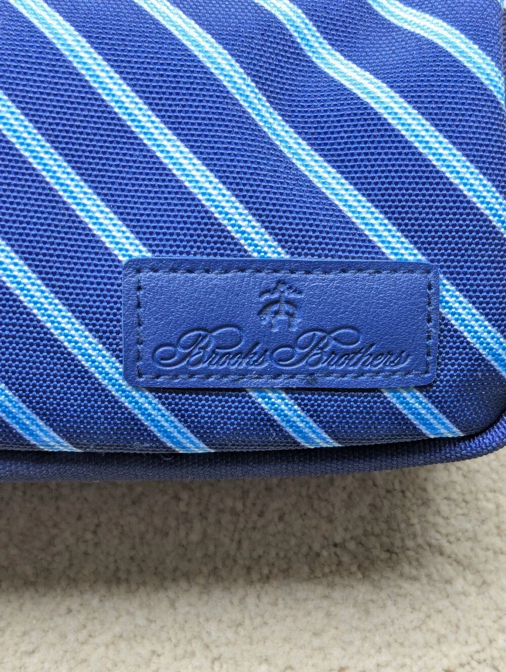 United x Brooks Brothers & Perricone MD products Amenity Bag